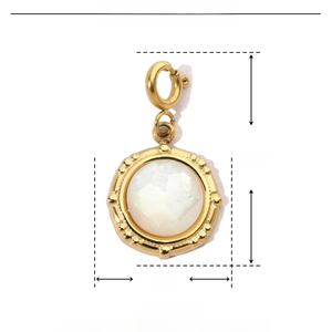 Macro shot of a 12mm x 20mm teardrop white stone pendant with gold stainless steel frame