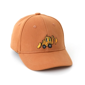 Close-up of yellow excavator embroidery on orange cotton baseball cap for kids