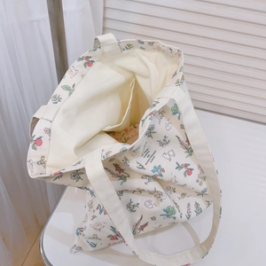 Floral animal print cream canvas tote bag with hedgehog and rabbit patterns for daily use