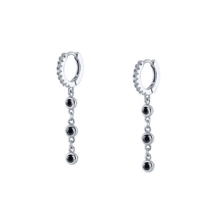 Detail of silver drop earrings with micro-pave crystals and three black round stones