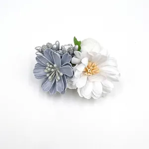 Elegant artificial flower hair clips in blue and white with silver berry accents