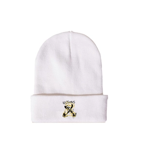 White knit beanie with turn-up cuff featuring NOTHING lettering and bear pattern