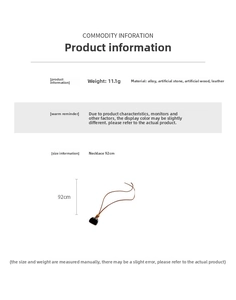 Detailed view of faux stone pendant with brown leather cord and wooden bead accents
