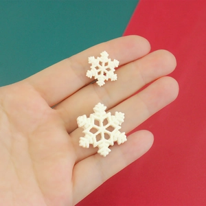 Sparkly white resin snowflake charms for DIY crafts and phone case decoration