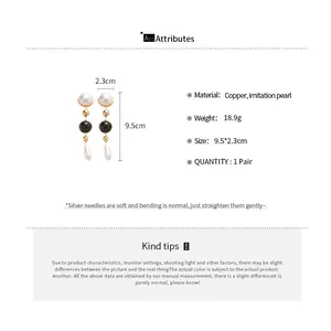 Size chart showing long pearl teardrop fringe earrings measuring 9.5cm by 2.3cm