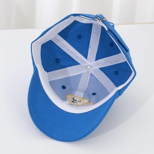 Detailed interior view of a blue toddler baseball cap featuring an adjustable metal buckle