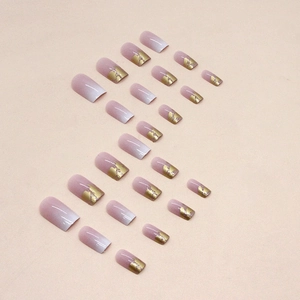 Elegant pink ombre press-on nails with gold foil and marble pattern in medium length