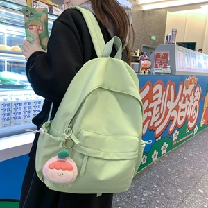 Minimalist light green nylon backpack with large capacity and cute plush pendant