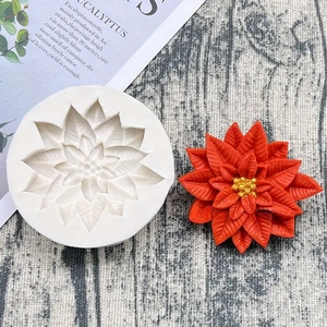 Christmas holly leaf silicone mold for DIY soap and fondant baking with a finished red flower