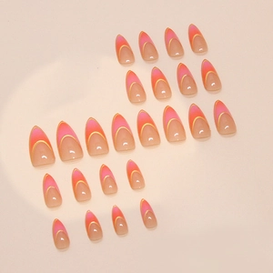 French gradient press-on nails with peach pink fade and elegant gold crescent line design