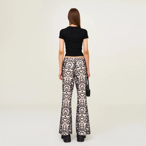 Leopard print wide leg sports pants with black slim t-shirt for modern streetwear look