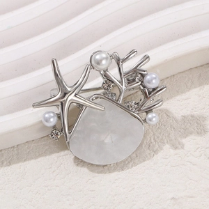 Silver starfish brooch with coral branches, pearls and seashell detail in ocean theme
