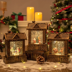 Set of 3 vintage bronze Christmas snow globe lanterns with Santa and snowman scenes