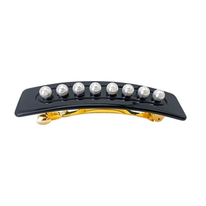 Vintage acetate hair clip with eight white pearls on a sleek black resin bar