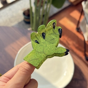 Green glitter monster palm claw clip made of acrylic for Halloween hair styling