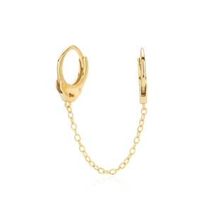 Detail of gold-plated double hoop chain earrings with handcuffs design and polished finish