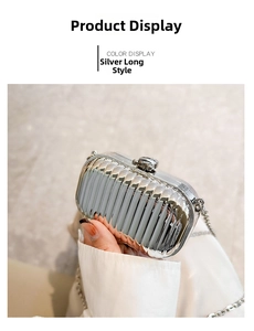 Close-up of a silver acrylic evening clutch with vertical ripples and a metal chain strap