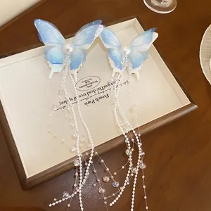Elegant blue gradient butterfly hair clip with long pearl tassels and mesh wings for women