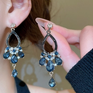 Vintage silver earrings with blue teardrop crystals and elegant pearl fringe tassels