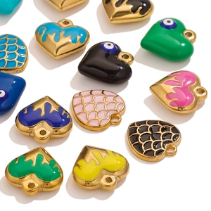 Retro stainless steel heart pendants with colorful enamel and fish scale texture on white background