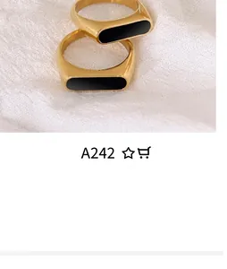Close-up of 18K gold-plated signet ring with rectangular black onyx inlay detail