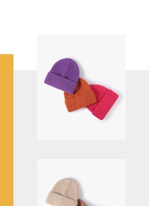 Detailed view of colorful ribbed knit beanies in purple orange and pink winter fabrics