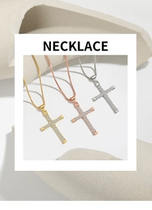 Detailed view of hip hop cross pendants in gold, rose gold, and silver with zircon stones