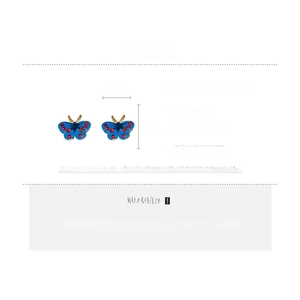 Blue enamel butterfly earrings with red rhinestones showing 1cm by 1.2cm dimensions