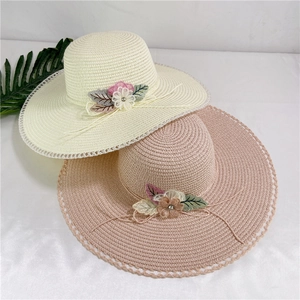 Elegant wide brim straw hats with lace edges and floral decor for sun protection