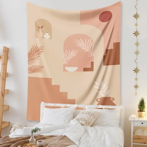 Detail of bohemian tapestry with geometric arches and palm leaves on bedroom wall