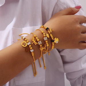 Gold stainless steel beaded bracelet set with tree of life and dragonfly charms
