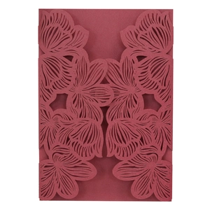 Laser-cut burgundy wedding invitation cover with intricate floral rose pattern design