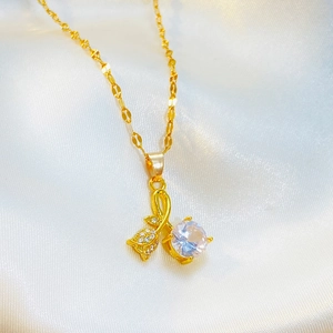 Luxury rose flower pendant necklace in gold with sparkling zircon and silk background