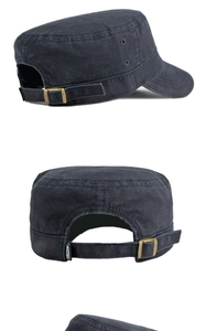 Detail of adjustable metal buckle and breathable holes on vintage flat top military cap