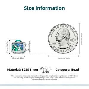 Macro view of S925 silver suitcase bead with size measurements next to a coin