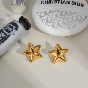 Polished gold star stud earrings in minimalist 3D geometric design for women