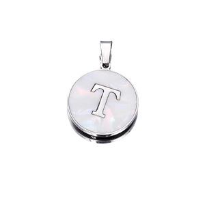 Macro detail of round stainless steel T-letter pendant with vintage pearlescent inlay