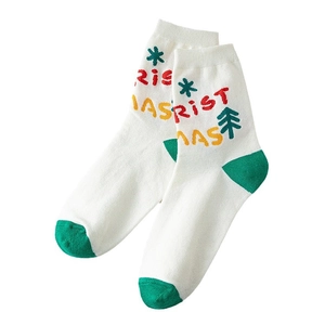 Chaussettes de Noël en coton avec motifs de flocons verts et lettrage rouge festif