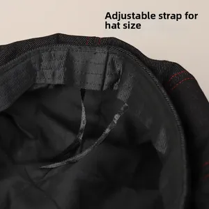Detail view of denim beret adjustable drawstring for size customization and lining