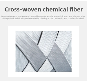 Detailed macro view of woven satin fabric with smooth silver cross-stitch texture