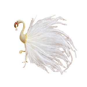Elegant zircon flamingo brooch with golden accents and soft white feather details