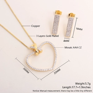 Detail view of 18k gold plated heart necklace and bar earrings set with AAA zircon