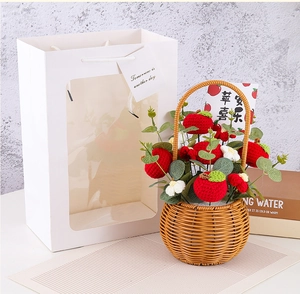 Macro detail of hand-knitted apple flower basket with gift bag and greeting card