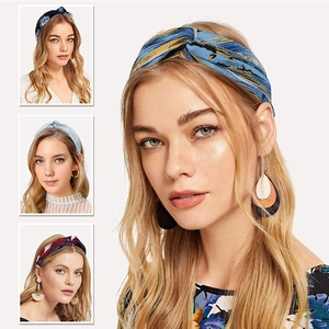 Cross-over fabric headbands for women featuring various stylish patterns and blue floral prints