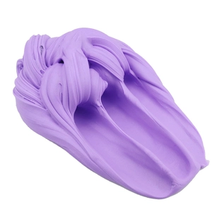 Detailed texture of smooth purple butter slime showing soft stretchy clay consistency
