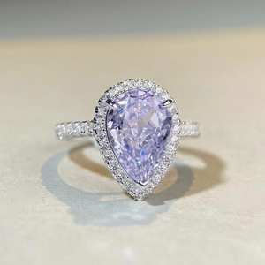 S925 sterling silver ring with pear-shaped lavender purple gemstone and clear zircon accents