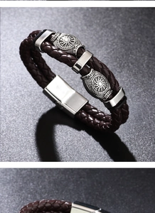Détail macro du bracelet en cuir tressé marron foncé avec fermoir argenté style Viking
