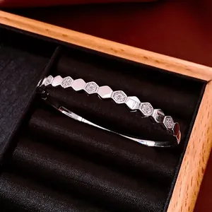 Elegant silver hexagonal honeycomb bangle with sparkling zircon pavé for women
