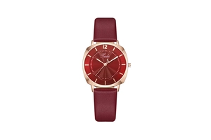 Detailed close-up of a red leather strap quartz watch with a rose gold square case