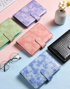 Detail of A6 macaron binder covers in five colors with luxury crocodile texture